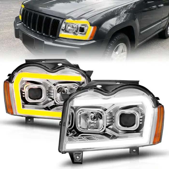 ANZO 05-07 Jeep Grand Cherokee Projector Headlights – w/ Light Bar Switchback Chrome Housing